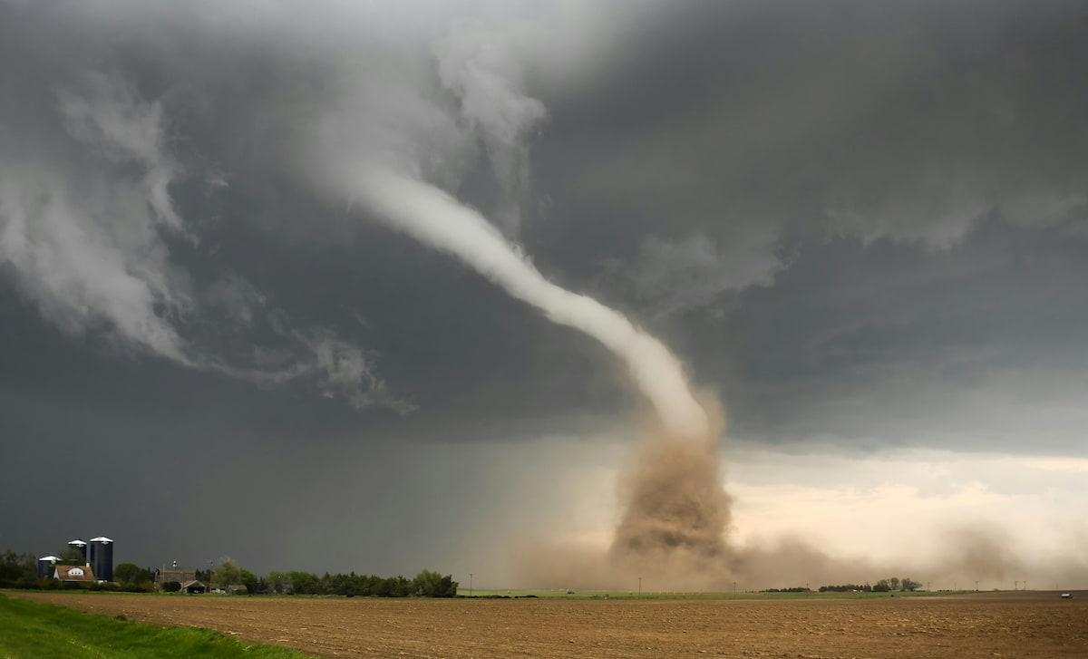 Dramatic supercell thunderstorm with a developing tornado.